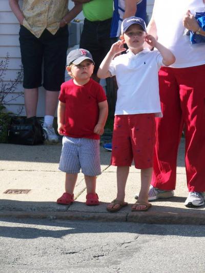 Teddy Sanders, left, and his brother William, of Mattapoisett, wait for the race to start. BY MATTHEW BERNAT