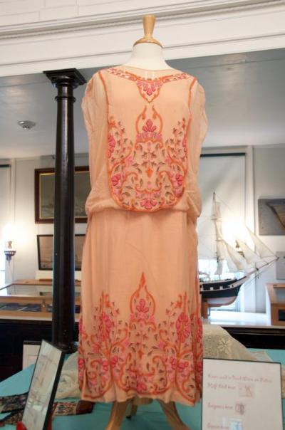 Hutchinson said many of the museum's items, including this flapper dress, don't have a story to go with them. BY GEORGIA SPARLING
