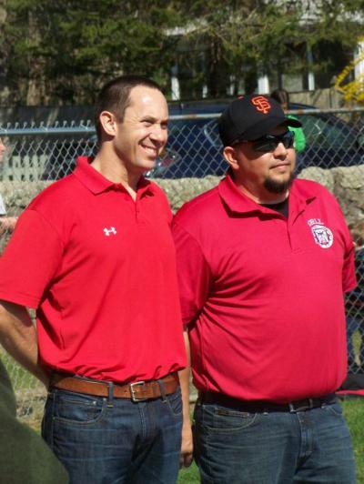 Past Little League President Peter Johnson, left, and current President Derek Mello address the crowd. BY MATTHEW BERNAT