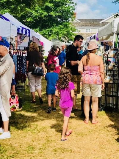 Hundreds of people filed through Shipyard Park during Harbor Days looking for a unique buy from teh many vendor booths. BY CHRIS REAGLE