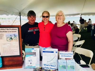 Friends of the Mattapoisett Bike Path Joe Sootkoos, left, Ann Bryant, and Robin Lepore were among the local community groups at information booths in the vendor area. BY CHRIS REAGLE