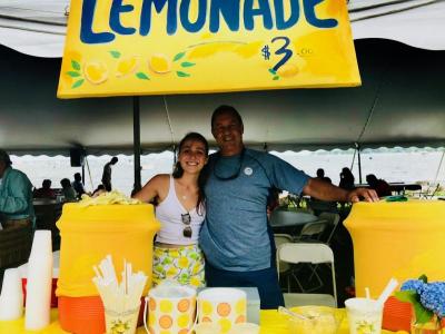 Mark Trahan, of Mattapoisett, and Meg Goulart, of Mattapoisett, sold fresh squeezed lemonade Saturday under the big white tent. BY CHRIS REAGLE