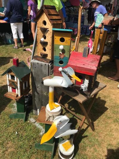 "For the Birds" offered handcrafted bird houses made from reclaimed wood and materials in the vendor booth area. BY CHRIS REAGLE
