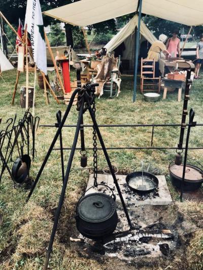 People visiting the Colonial War encampment this past weekend at Silvershell Beach were given many demonstrations, including how to cook 18th century food over a campfire. BY CHRIS REAGLE