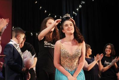 Miss Inspirational backstage buddy Brianna Lynch crowns Zoe Dora at the end of the pageant. Photo by: Katherine Glosser