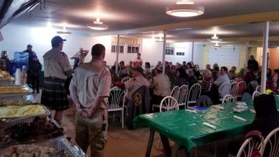 Scoutmaster Kevin Thompson gave thanks to Rochester firefighters, police, EMTs and the Grange Hall Association for their unwavering support of Rochester Troop 31. His words were followed by a prayer and blessing of the meal from Troop Chaplain David Andrews.
Photo by Ilana Mackin