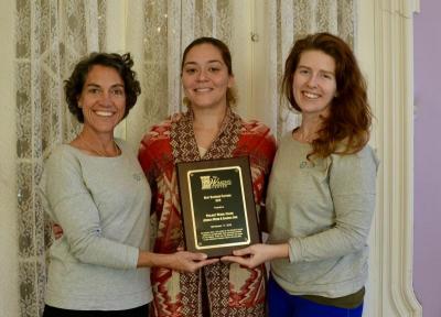 Jessica Webb, founding director of Project Wheel House, Jahira Cruz, Bilingual Services Coordinator/Group Coordinator at The Women’s Center, and Sandra Orr, Yoga Instructor for Project Wheel House. Photo by: Jessica Webb
PHOTO 3: The plaque presented to Jessica Webb and Sandra Orr of Project Wheel House symbolizing a partnership dedicated to women's empowerment and resiliency in New Bedford.