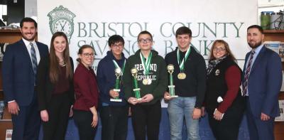 From left to right: Jeffrey Pelletier, president, Junior Achievement of Southern MA; Nicole Nault, events & development manager, Junior Achievement of Southern MA; school coordinator Ashleigh Mota-Medeiros; students Kyle Wright, Jacob Andrews and Eric Hackett; school coordinator Marsha Metivier; and Michael Patacao, president, Board of Directors, JA of Southern MA and VP/Commercial Lending, Bristol County Savings Bank. Photo courtesy: David Hughes