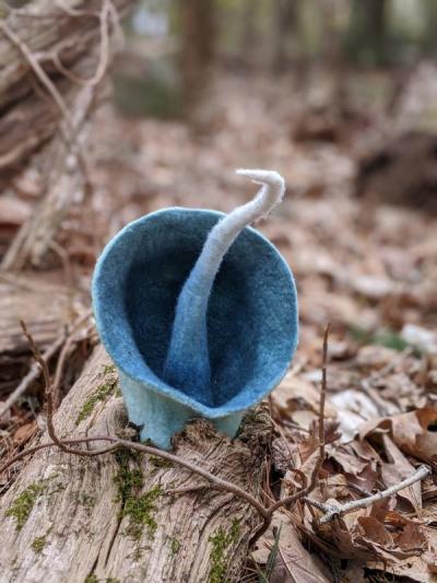Anna Kristina Goransson felted this fantastic plant coming out of a log. Photo courtesy: Marion Art Center