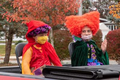 Kids ride in the back of a pickup truck for the Mattapoisett Lion Club’s Mini Fall Family Halloween Drive-by on Oct. 24. Photo courtesy: Kimberly Ray Photography.