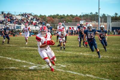 OR’s Jacksen Martin catches a pass and turns up field to score a Bulldog touchdown at the Thanksgiving Day game against Apponequet. Photo by: Morgan Beard.