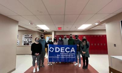 The Distributive Education Clubs of America board at Old Rochester Regional includes, from left, Beth Trout (advisor), Aiden Harrington (vice president of career development), Kinsley Trout (vice president of hospitality), Kira Sarkarati (co-president), Sarah Wyman (vice president of marketing), Theodore Carroll (vice president of finance), Edward Gonet IV (vice president of leadership), David Ditata (co-president), Alyssa Whitney (advisor). Photo courtesy: Old Rochester Regional chapter, Distributive Educational Clubs of America