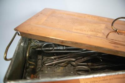 A copper box of medical tools owned by Dr. Tilden. Copper has unique anti-bacterial qualities, making it well suited to medical work.