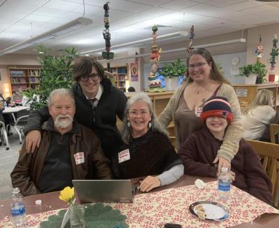 Ninth grade student Aiden Cabral and his family at the ORR Genealogy event. (Photo Courtesy Old Rochester Regional School District and MA Superintendency Union #55)