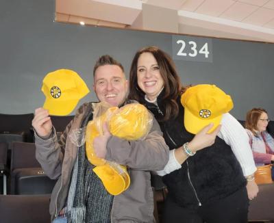 Fifth-grade teacher Mike Forns, left, and music and chorus teacher Susan Audette at the Providence Bruins game. Source: Old Rochester Regional School District and MA Superintendency Union #55