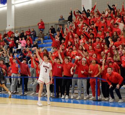 Zack Mourao looks on at his 3-point attempt during Old Rochester’s semifinal game victory to reach the state championship Monday, March 11. Photo by Brendan Cassidy