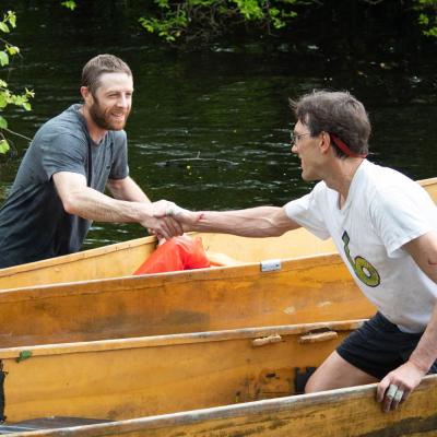 Ian MacGregor and Paul Milde shake hands after finishing Rochester Memorial Day Boat Race on Monday, May 27. Photo by Sawyer Smook-Pollitt
