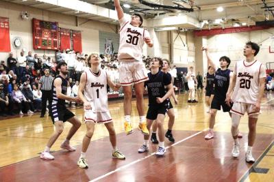 Old Rochester sophomore Hunter Horsey propels himself into the air, looking to gain possession of the ball.