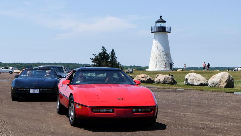 A couple of corvettes carved the turn out of the park.