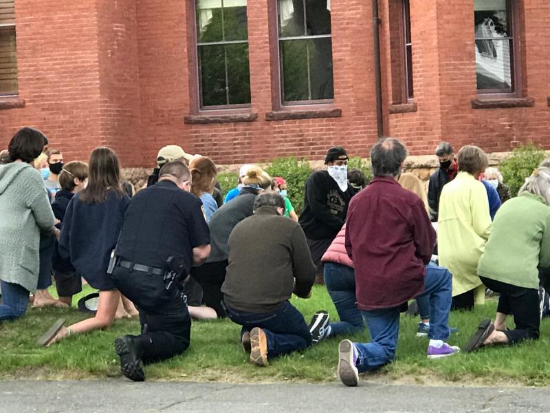 Chief John Garcia (in black) and Selectman Randy Parker attended the Marion protest. Photo by: Hollie Danhauser