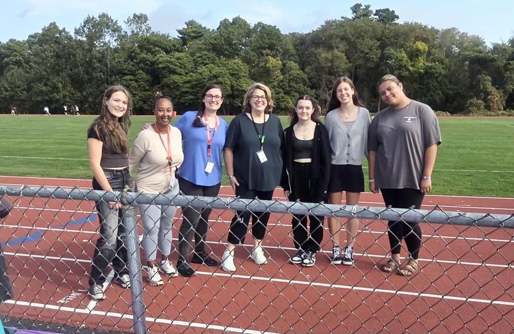 (from left to right) Junior Sage Elia, social worker Rosemary Williams, school psychologist Julie Andrade, social worker Kerri Dowdall, junior Abby Desorcy, junior Zadie Goyette and junior Ava Ross-Sinkler at Old Rochester's "Walk a Mile in My Shoes'. Source: Kerri Dowdall (from left to right) Junior Sage Elia, social worker Rosemary Williams, school psychologist Julie Andrade, social worker Kerri Dowdall, junior Abby Desorcy, junior Zadie Goyette and junior Ava Ross-Sinkler at Old Rochester's "Walk a Mile in My Shoes'