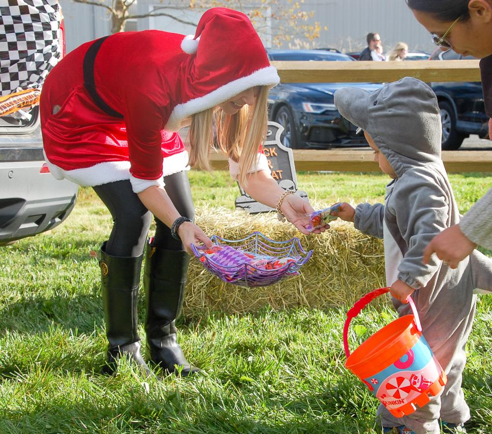 Lauren Roberts hands out candy to a small but mighty shark. Lauren Roberts hands out candy to a small but mighty shark.
