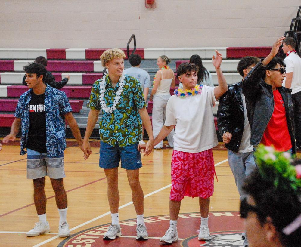 The seniors wave goodbye after their skit is over. The seniors wave goodbye after their skit is over.