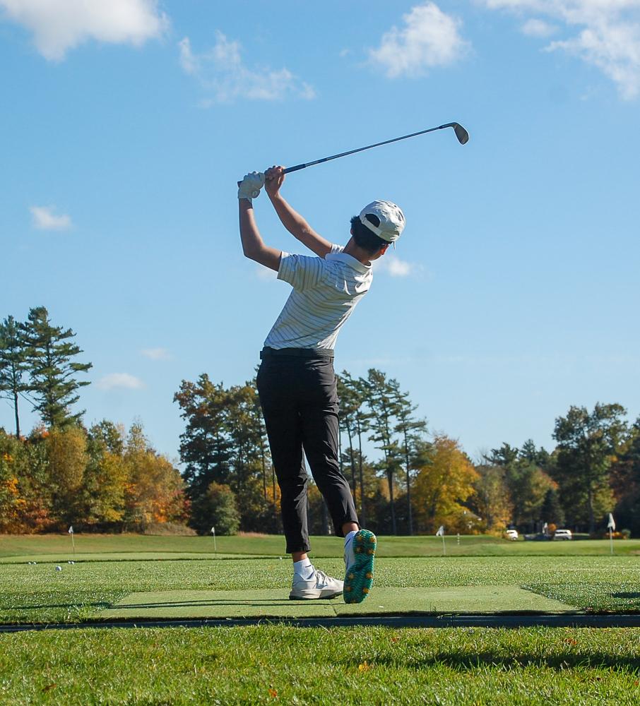 John Bongiorno watches the ball fly.  John Bongiorno watches the ball fly.