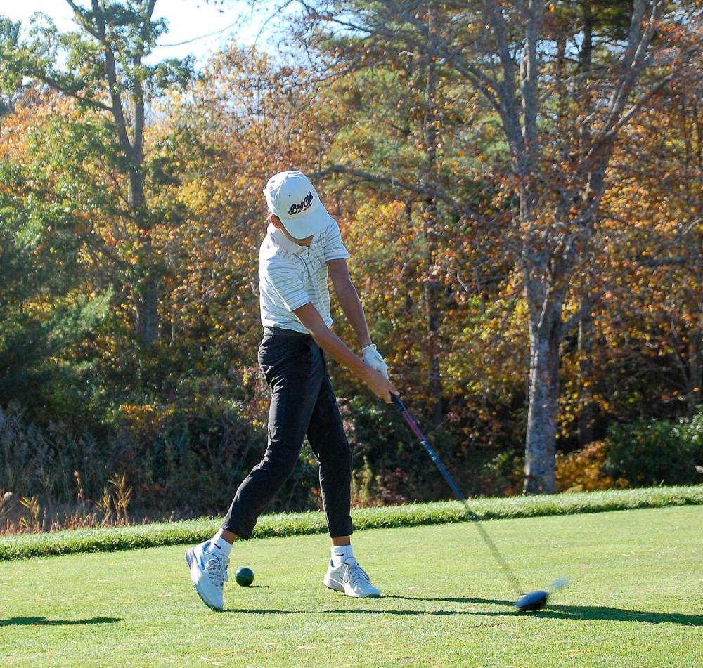 John begins his round.  John begins his round.