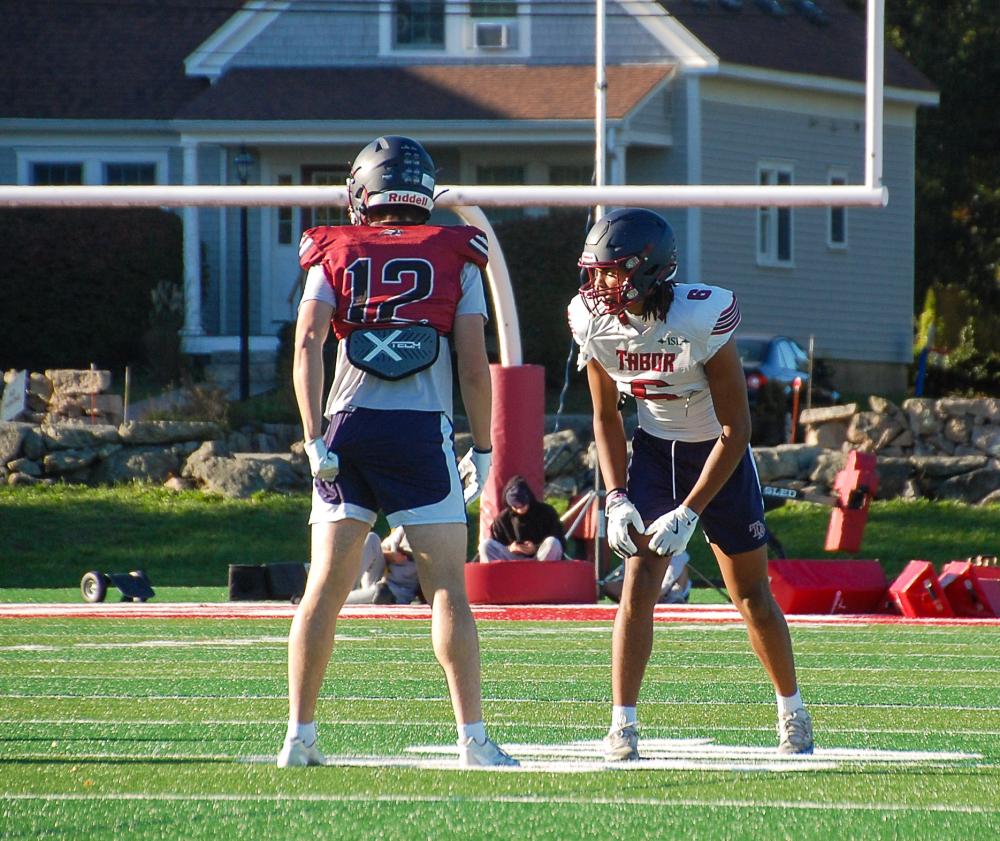 Xander Odenyo (white) faces off against Mikey Landers (red). Xander Odenyo (white) faces off against Mikey Landers (red).