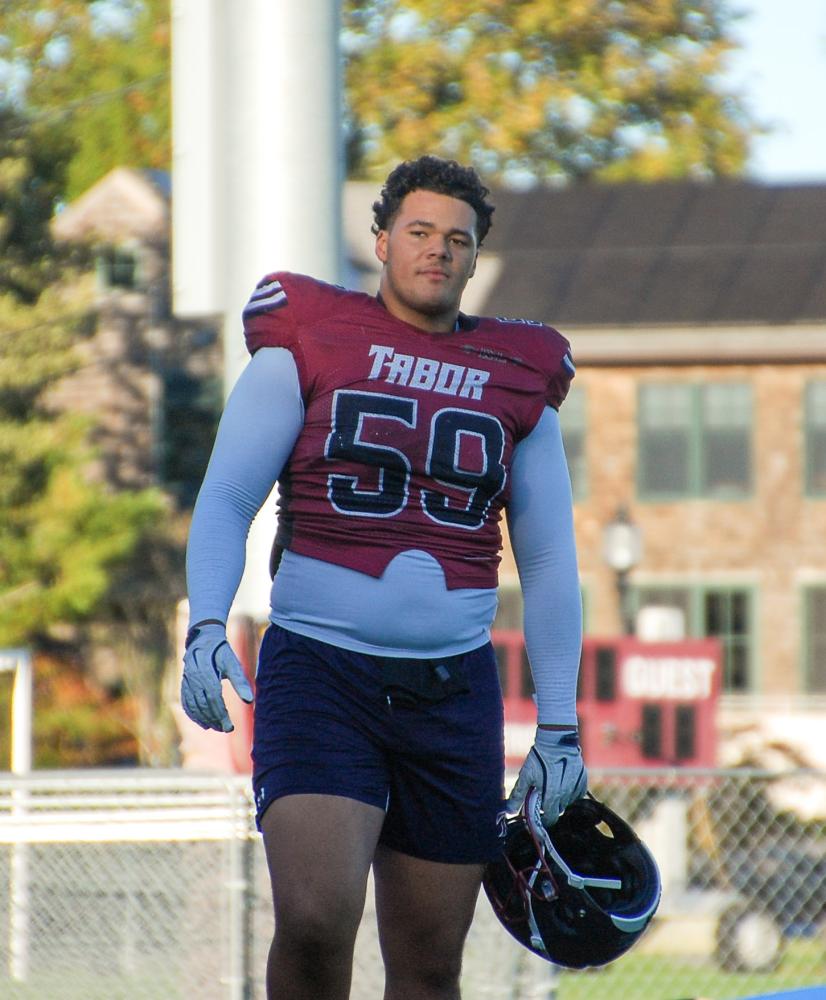 Marcus Almada walks off from practice. Marcus Almada walks off from practice.