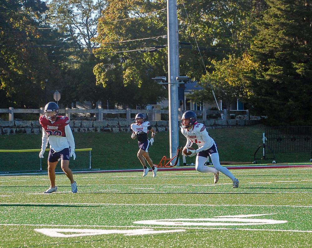 Trey Grant rushes to get yards. Trey Grant rushes to get yards.