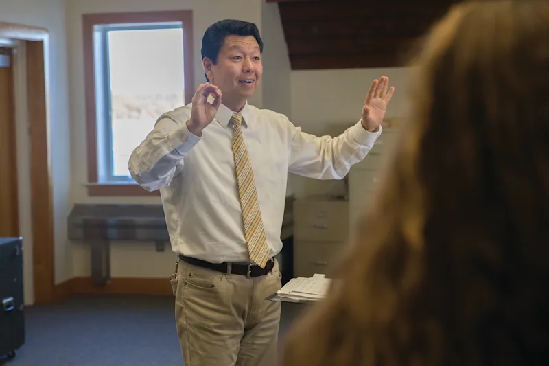 Zhou works as a Director of Choral Music at Tabor Academy. Source: Tabor Academy
