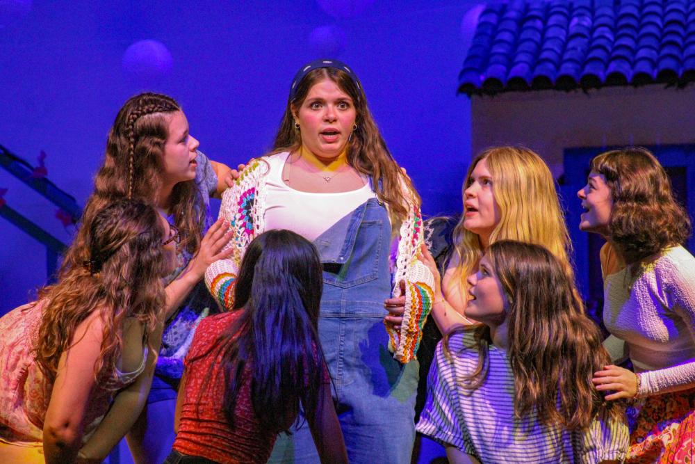 Amanda Tomasso, center, portrays Donna Sheridan in "Mamma Mia!" during a Monday, May 4 dress rehearsal at Old Rochester Regional High School. Photos by Grace Roche