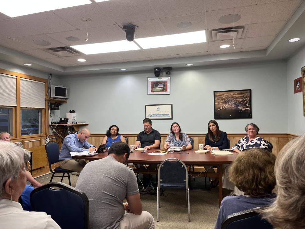 From left: Town Administrator Michael Lorenco and Select Board members Frances-Feliz Kearns, Jordan Collyer, Jodi Bauer, Nicole Doyon Lynch and Judy Mooney at the Tuesday, June 9 meeting. Photo by Grace Roche