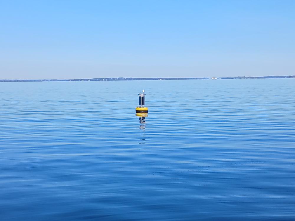 An offshore wave buoy floats off the coast of Mattapoisett in Buzzards Bay. Photo source: Stone Living Lab.