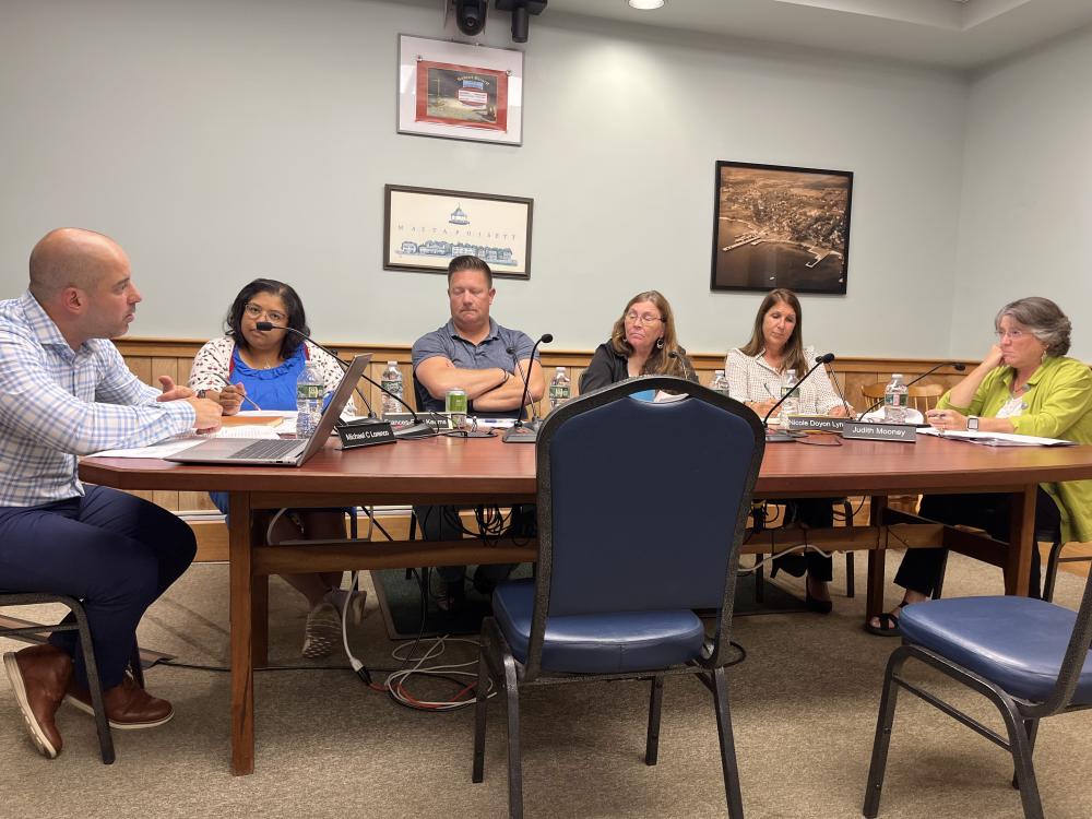 Town Administrator Michael Lorenco, left, speaks to the Select Board at a Tuesday, Sept. 8 meeting. Photo by Grace Roche