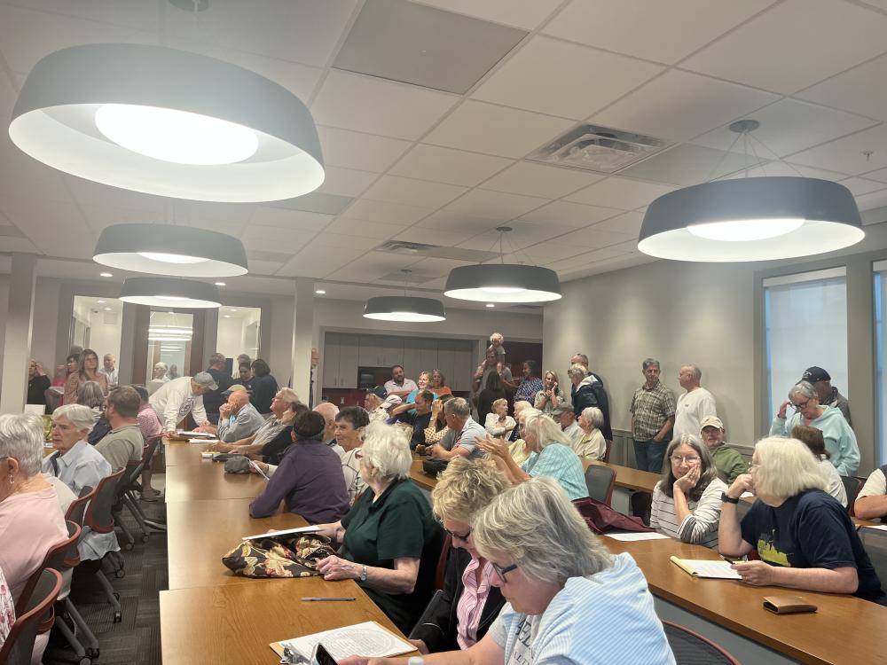Over 70 people packed the Mattapoisett Fire Department for a Conservation Commission hearing Monday, Sept. 14. Photo by Grace Roche