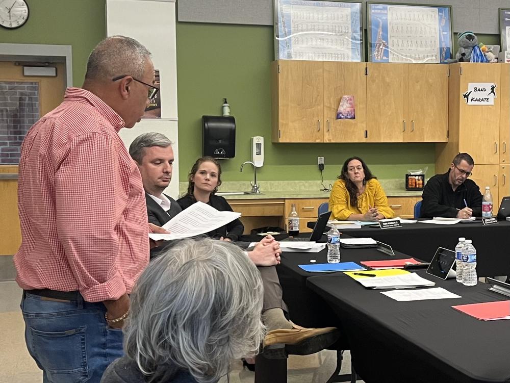 Luis Rivera, left, speaks during a Thursday, Sept. 24 School Committee meeting. Photo by Grace Roche