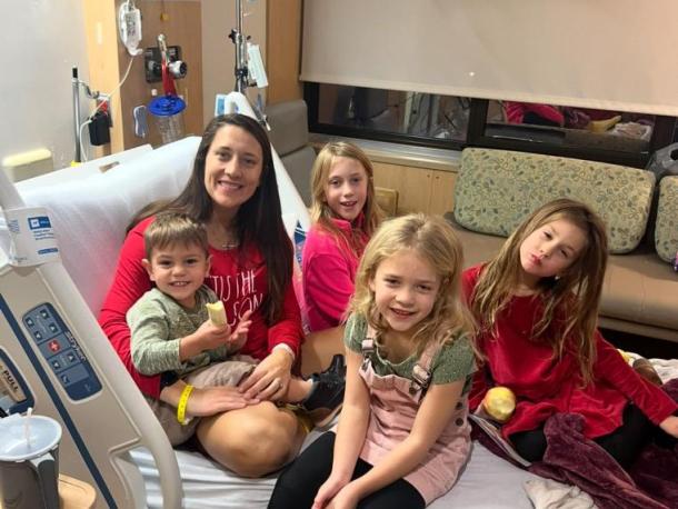 Pease and her 4 children visiting in the hospital, December 5, 2024, the day Pease was diagnosed with MS.