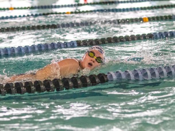 Elizabeth Chubb swims down a lane at the  Gleason Family YMCA during a Friday, Jan. 23 practice. Photos by Bobby Grady