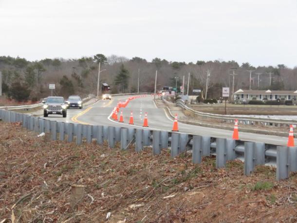 Cars travel the narrowed Route 6 bridge across the Weweantic River amidst ongoing construction. Photo by Grace Roche