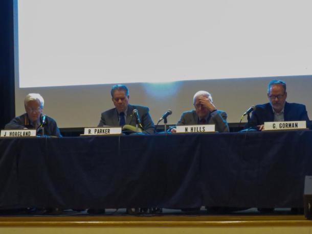 From left: Select Board members  John Hoagland, Norman Hills, Randy Parker and Town Administrator Geoffrey Gorman at the Special Town Meeting on Monday, March 23. Photo by Grace Roche