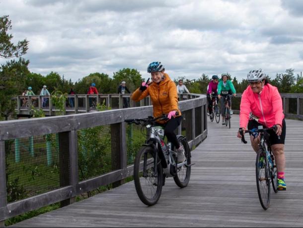 Cyclists smile for the camera at a past Tour de Creme ride. Photo source: Mattapoisett Land Trust
