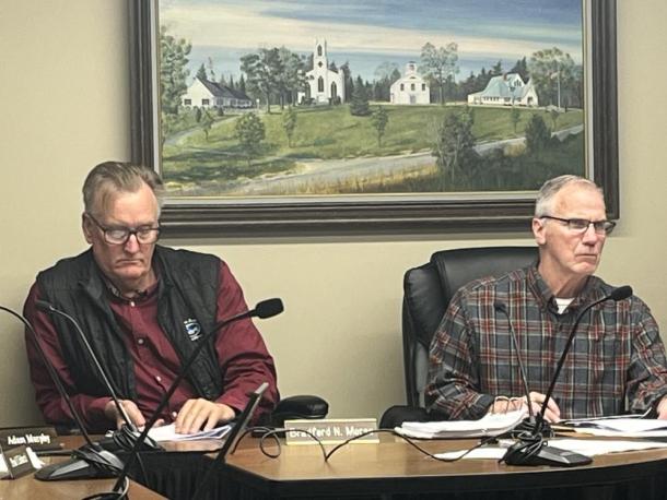 Select Board member Bradford Morse and Finance Committee member James Austin at a Wednesday, April 22 meeting. Photo by Grace Roche
