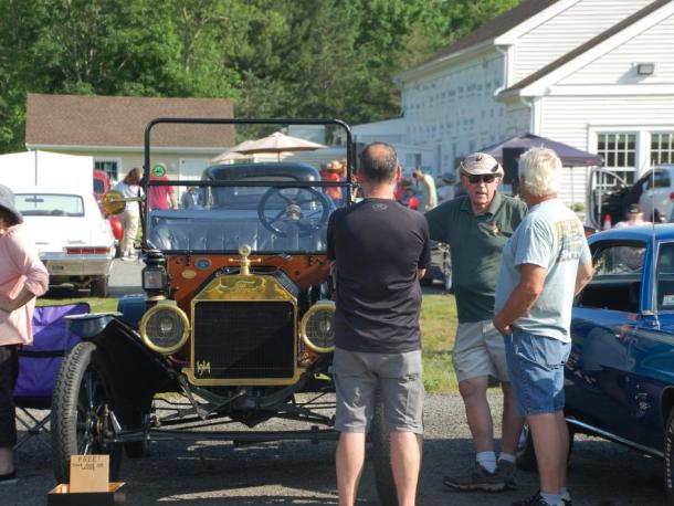 Visitors admire a Model T from 1914 at the Rochester Center on Aging on Thursday, June 11. Photos by Grace Roche
