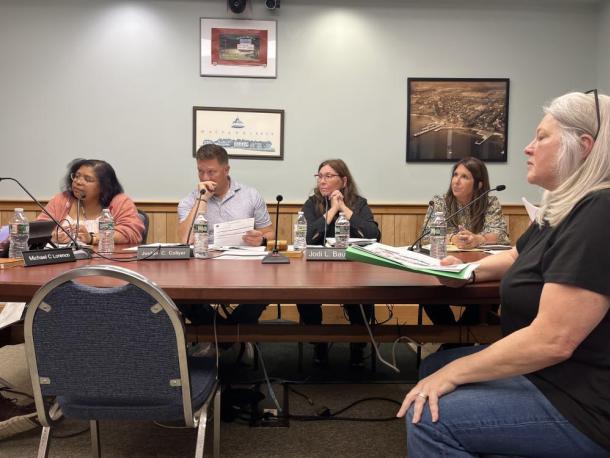Kathy Abbruzzetti, right, defends her dog during a Tuesday, June 23 Select Board meeting. Photo by Grace Roche