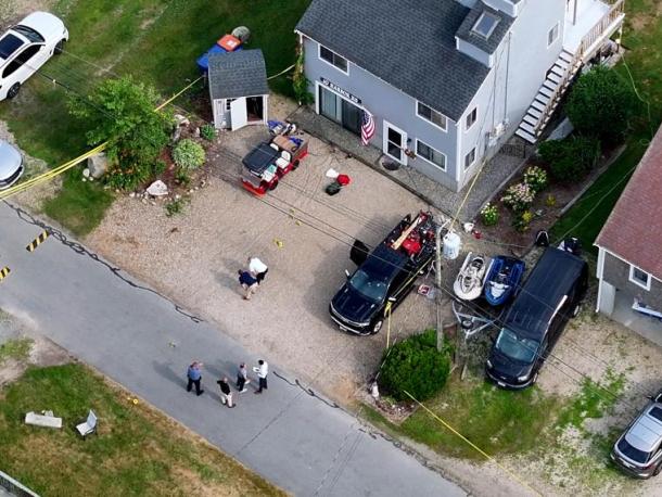 Police investigate 10 Harbor Road where the shooting occurred on June 30. Photos by David Curran