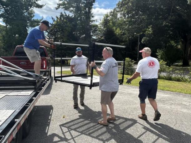 Mattapoisett Lions Club members unload part of a ramp they installed for a Marion family Saturday, Sept. 5. Photos source: Mattapoisett Lions Club