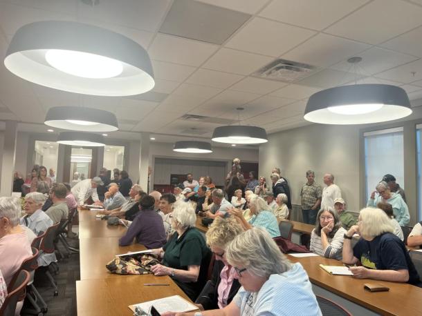 Over 70 people packed the Mattapoisett Fire Department for a Conservation Commission hearing Monday, Sept. 14. Photo by Grace Roche
